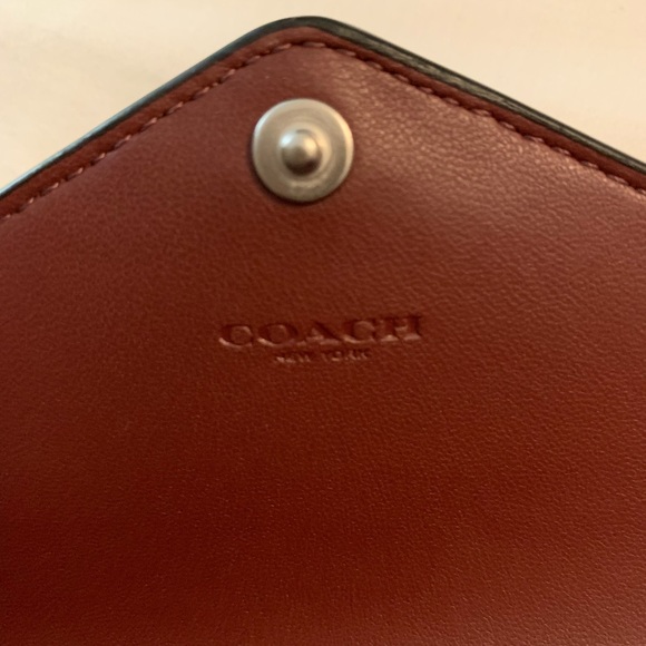 Brand new coach wallet. Never used. Black with wild print - Picture 9 of 10